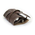 Leather Wrap Accessory Case stores cords and headphones