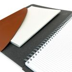 Slim pocket can accomodate a booklet